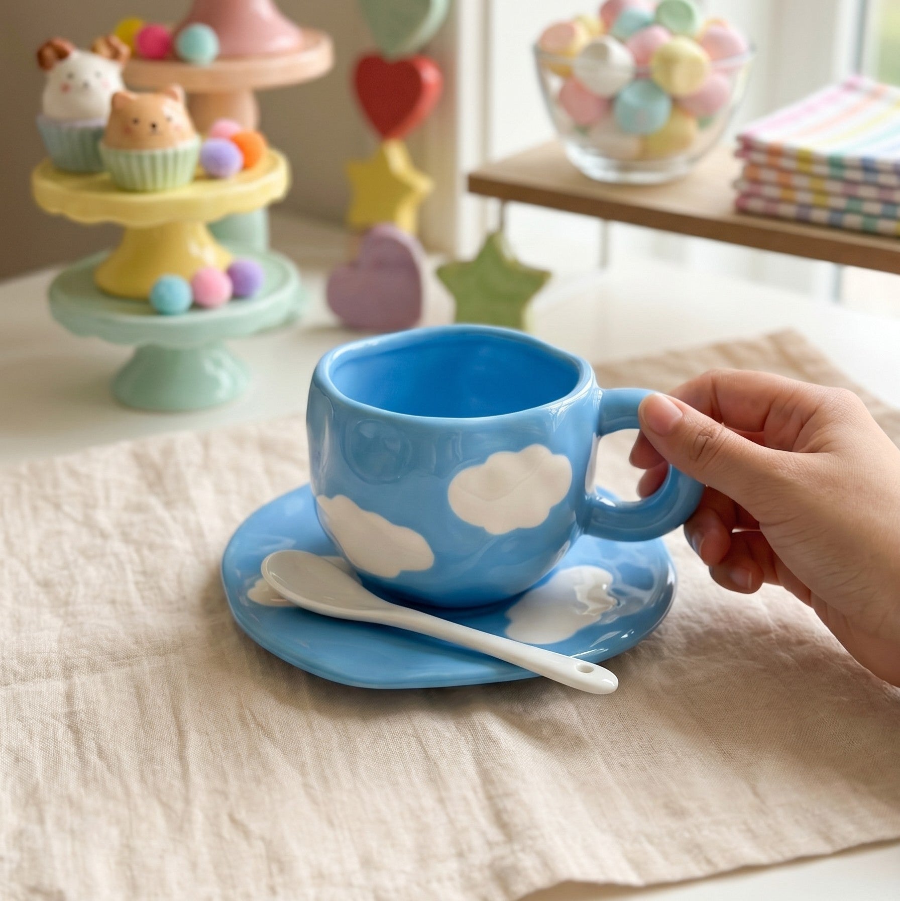Keeyos PH Chunky light blue ceramic cup and saucer set with white cloud design. Unique handle.