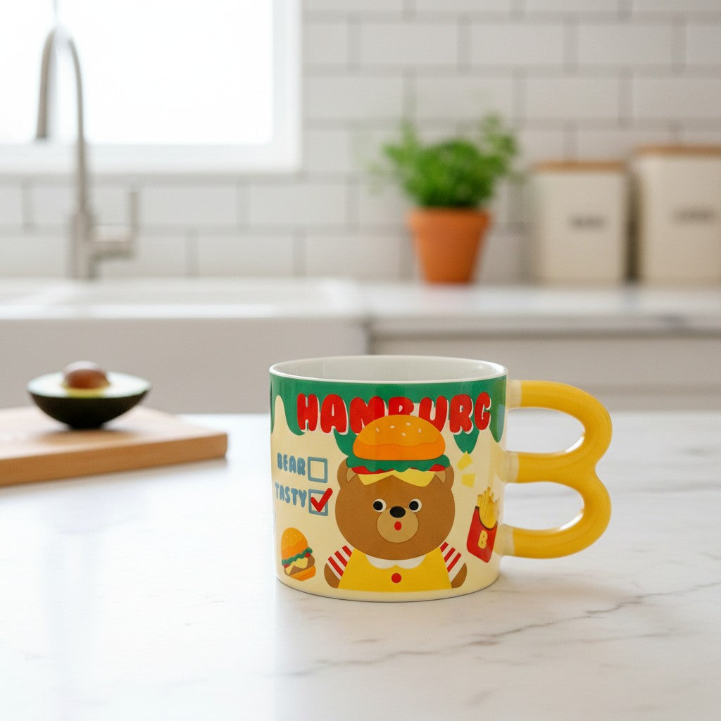 Keeyos PH yellow mug with a cute bear wearing a hamburger and french fries graphic. Features "HAMBURG" text.