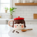 Keeyos PH Pippa Blushing Mug with a red beret lid, brown hair, and rosy cheeks.